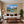 Leinwandbild Berglandschaft mit See fuer Wohnzimmer warmeFarben Querformat