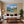 Leinwandbild Berglandschaft mit See fuer Wohnzimmer warmeFarben Querformat