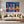 Leinwandbild Bunte Gitarren in der Stadt160x120 cm Querformat