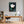 Leinwandbild Elegante weiße Tulpe fuer Buero und Arbeitszimmer warmeFarben Hochformat
