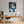 Leinwandbild Entspanntes Löwenbaby im Glas fuer Buero und Arbeitszimmer warmeFarben Hochformat