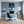 Leinwandbild Kleiner Leopard im Wasser fuer Buero und Arbeitszimmer blau Hochformat