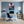 Leinwandbild Kunst der Berührung fuer Buero und Arbeitszimmer blau Hochformat