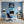 Leinwandbild Rhinoliebe im Glas fuer Buero und Arbeitszimmer blau Hochformat