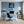 Leinwandbild Rhinoliebe im Glas fuer Buero und Arbeitszimmer blau Hochformat