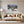 Poster Wandbild 120x80 cm Schneeleopard im Winterwunderland Querformat