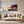 Poster Wandbild 120x80 cm Sonnenuntergang mit Bougainvillea Querformat