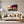 Poster Wandbild 120x80 cm Sonnenuntergang mit Bougainvillea Querformat