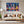 Poster Wandbild 150x100 cm Bunte Gitarren in der Stadt Querformat