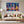 Poster Wandbild 150x100 cm Bunte Gitarren in der Stadt Querformat