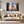 Poster Wandbild 150x100 cm Gigantische Violine in der Stadt Querformat