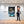 Poster Wandbild 80x120 cm Verspielt und Niedlich Leopardenjunges im Glas Hochformat