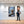 Poster Wandbild 80x120 cm Verspieltes Eichhörnchen im Winterwald Hochformat