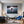 Poster Wandbild Astronaut im Weltall fuer Wohnzimmer blau Querformat