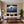 Poster Wandbild Astronaut im Weltall fuer Wohnzimmer warmeFarben Querformat
