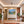 Poster Wandbild Berglandschaft mit See fuer Flur und Eingang warmeFarben Querformat