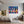 Poster Wandbild Bunte Gitarren in der Stadt fuer Jugendzimmer grauoderbeige Querformat