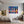 Poster Wandbild Bunte Gitarren in der Stadt fuer Jugendzimmer grauoderbeige Querformat