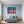 Poster Wandbild Bunte Gitarren in der Stadt fuer Schlafzimmer blau Querformat