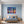 Poster Wandbild Bunte Gitarren in der Stadt fuer Schlafzimmer blau Querformat