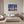 Poster Wandbild Bunte Gitarren in der Stadt fuer Schlafzimmer grauoderbeige Querformat