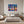 Poster Wandbild Bunte Gitarren in der Stadt fuer Schlafzimmer grauoderbeige Querformat