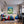 Poster Wandbild Dynamischer Tennis-Moment fuer Jugendzimmer warmeFarben Hochformat