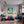 Poster Wandbild Dynamischer Tennis-Moment fuer Jugendzimmer warmeFarben Hochformat