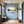 Poster Wandbild Eisige Seifenblase im Sonnenlicht fuer Flur und Eingang blau Querformat