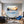 Poster Wandbild Eisige Seifenblase im Sonnenlicht fuer Wohnzimmer blau Querformat
