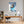 Poster Wandbild Entspanntes Nashorn im Glas fuer Buero und Arbeitszimmer warmeFarben Hochformat