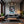Poster Wandbild Entspanntes Nilpferd im Glas fuer Wohnzimmer dunkelanthrazit Hochformat