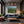 Poster Wandbild Grüne Landschaft mit Fluss fuer Wohnzimmer dunkelanthrazit Querformat