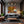 Poster Wandbild Herbstliche Landschaft am Wasser fuer Wohnzimmer dunkelanthrazit Querformat