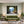 Poster Wandbild Idyllische Berglandschaft fuer Wohnzimmer gruen Querformat