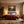 Poster Wandbild Mystischer Wald mit Sonnenstrahlen fuer Schlafzimmer warmeFarben Querformat