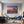 Poster Wandbild Romantisches Strandzelt bei Sonnenuntergang B-00019 fuer Wohnzimmer blau Querformat