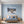 Poster Wandbild Schneeleopard im Winterwunderland fuer Schlafzimmer blau Querformat