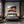 Poster Wandbild Sonnenuntergang mit Bougainvillea fuer Schlafzimmer dunkelanthrazit Querformat