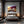 Poster Wandbild Sonnenuntergang mit Bougainvillea fuer Schlafzimmer dunkelanthrazit Querformat