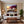 Poster Wandbild Sonnenuntergang mit Bougainvillea fuer Wohnzimmer warmeFarben Querformat