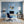 Poster Wandbild Traumhafte Berglandschaft in einer Seifenblase fuer Buero und Arbeitszimmer blau Quadrat