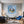 Poster Wandbild Traumhafte Berglandschaft in einer Seifenblase fuer Wohnzimmer blau Quadrat
