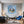 Poster Wandbild Traumhafte Berglandschaft in einer Seifenblase fuer Wohnzimmer blau Quadrat