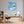 Poster Wandbild Traumhafte Seifenblase am Strand fuer Buero und Arbeitszimmer warmeFarben Quadrat