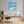 Poster Wandbild Traumhafte Seifenblase am Strand fuer Buero und Arbeitszimmer warmeFarben Quadrat