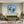 Poster Wandbild Tropische Traumwelt fuer Wohnzimmer gruen Quadrat