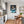 Poster Wandbild Verspielt und Niedlich Leopardenjunges im Glas fuer Kueche und Esszimmer grauoderbeige Hochformat