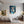Poster Wandbild Verspielte Freude im Glas fuer Jugendzimmer grauoderbeige Hochformat