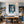 Poster Wandbild Verspielte Freude im Glas fuer Kueche und Esszimmer blau Hochformat